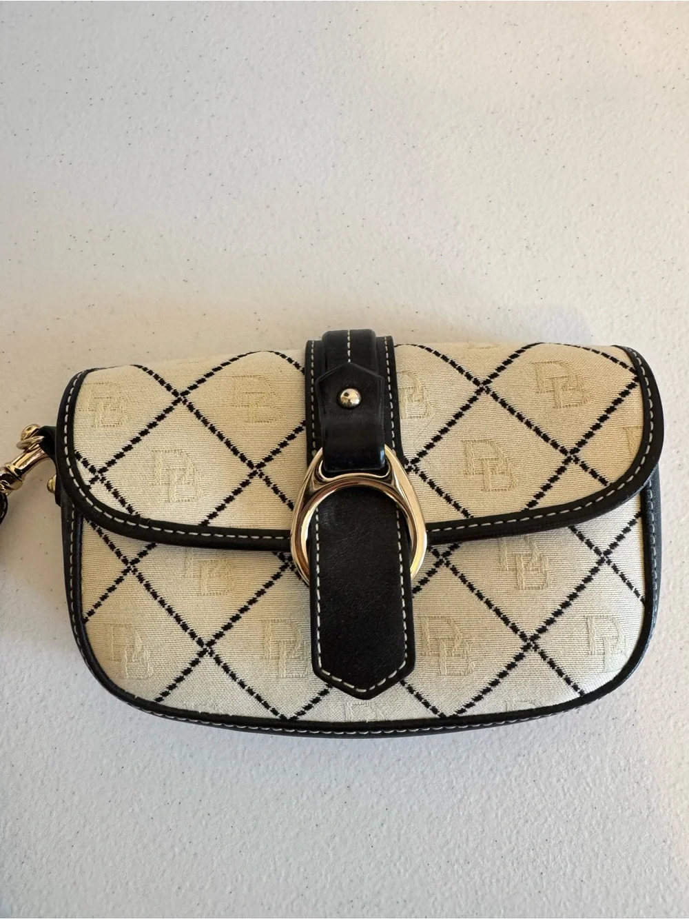 Dooney & Bourke Cream and navy Wristlet with Logo Diamond Pattern